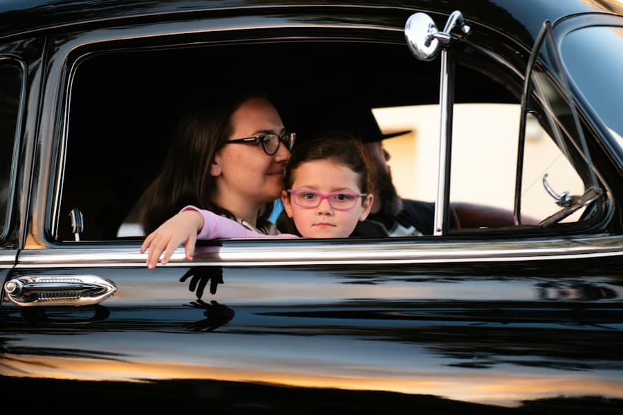 A mom and her daughter in their car