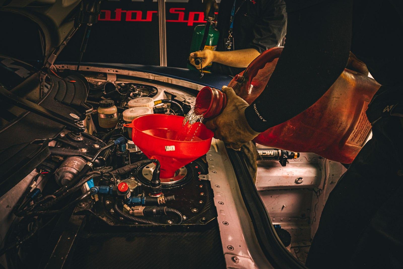 Fresh oil being poured into an engine